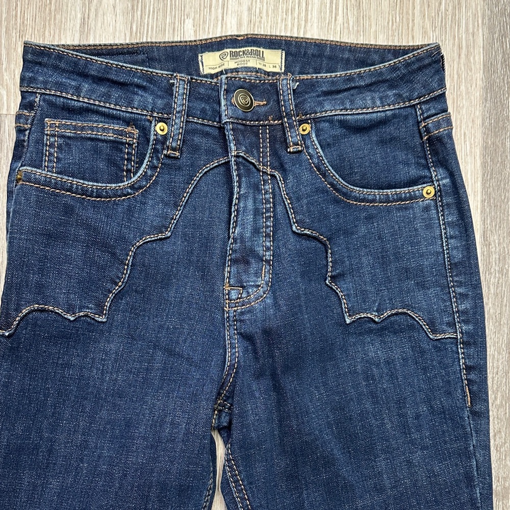Rock and roll cowgirl boot, cut jeans only worn twice